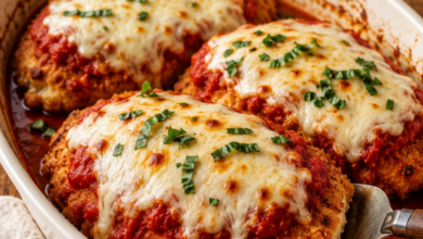 Oven baked chicken Parmesan with crispy breaded chicken, marinara sauce, melted mozzarella and fresh herbs.