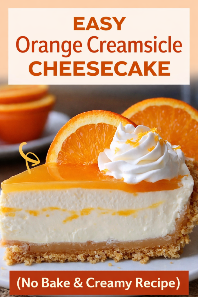 Slice of creamy no-bake orange creamsicle cheesecake with graham cracker crust topped with whipped cream and fresh orange slice