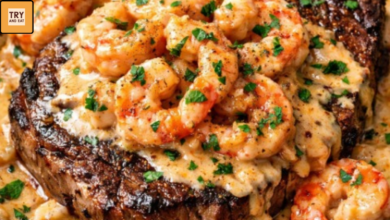 Juicy ribeye steak topped with creamy Cajun shrimp sauce made with garlic parmesan cream