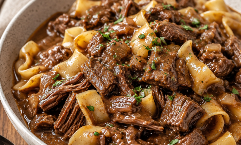 Slow cooker beef and noodles with tender chuck roast and wide egg noodles in rich brown gravy