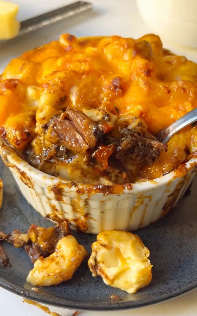 Braised Oxtail with Golden Mac & Cheese Crust