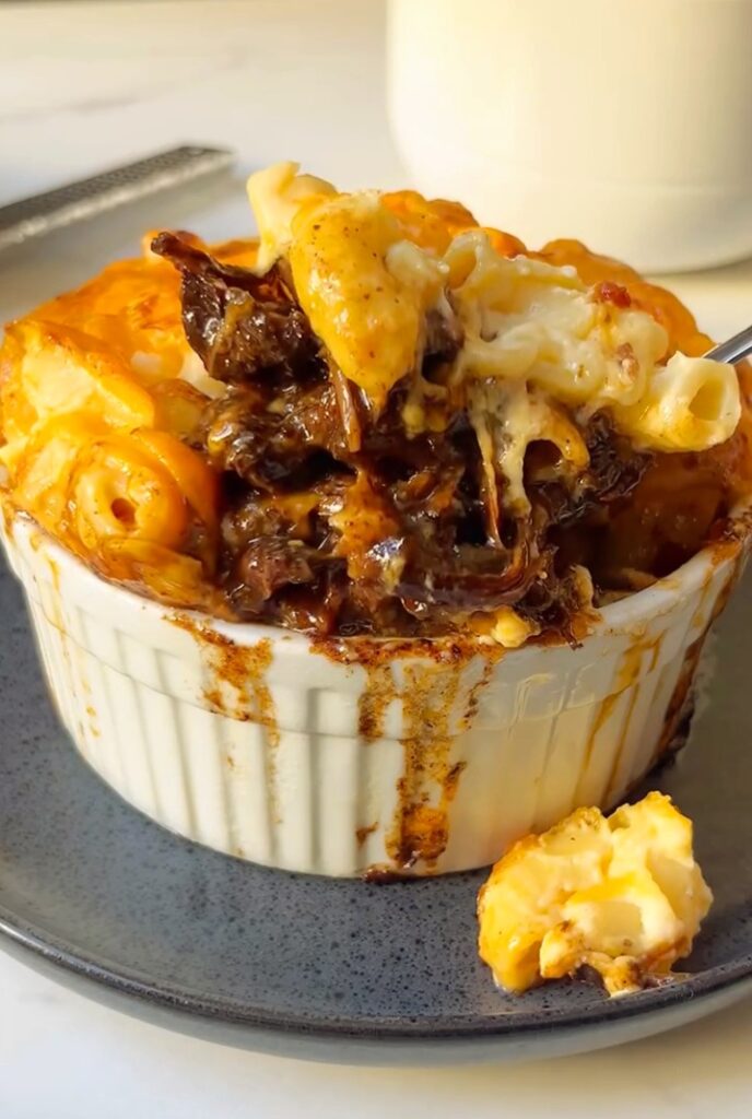Braised Oxtail with Golden Mac & Cheese Crust