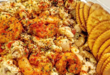 loaded seafood macaroni salad with seasoned shrimp and herbs