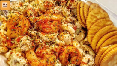 loaded seafood macaroni salad with seasoned shrimp and herbs
