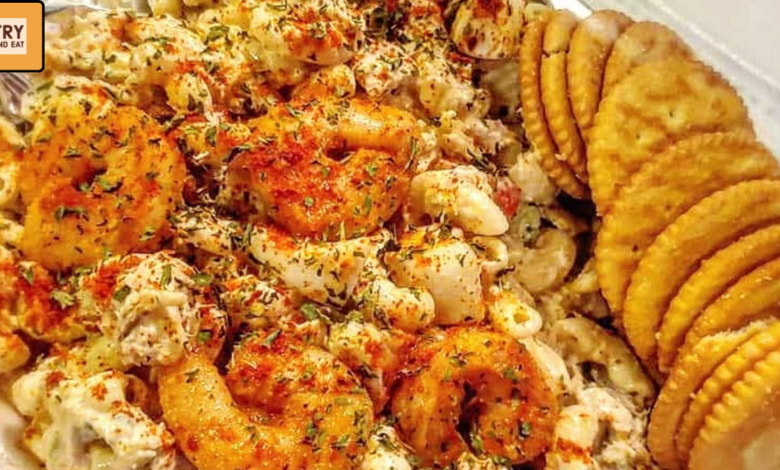 loaded seafood macaroni salad with seasoned shrimp and herbs