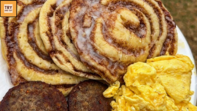 Thick cinnamon swirl pancakes stacked with glossy icing topping