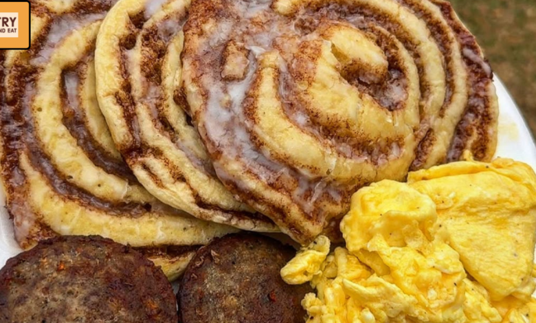 Thick cinnamon swirl pancakes stacked with glossy icing topping