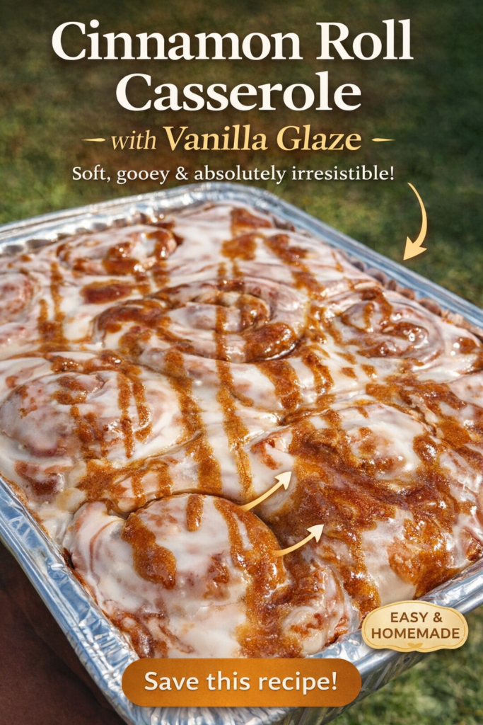 Soft homemade cinnamon rolls covered in vanilla glaze and caramel drizzle in baking pan