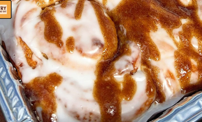 Gooey cinnamon rolls topped with white glaze and cinnamon caramel sauce.
