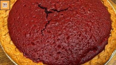 Slice of layered sweet potato pie with red velvet cake top