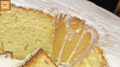 Dense lemon Bundt pound cake slice with cream cheese glaze