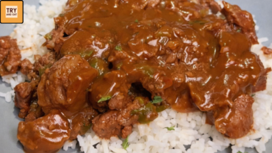 Tender no peek beef tips served over rice with rich onion gravy baked in the oven