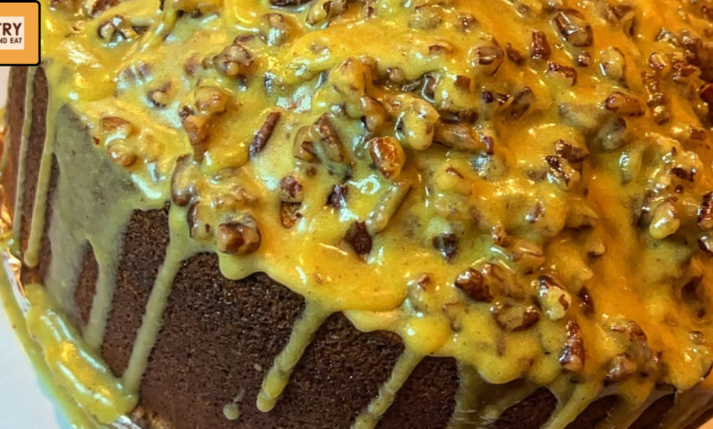 Moist southern sweet potato bundt cake topped with caramel pecan glaze