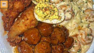 southern comfort food platter with crispy chicken creamy pasta and glazed meatballs