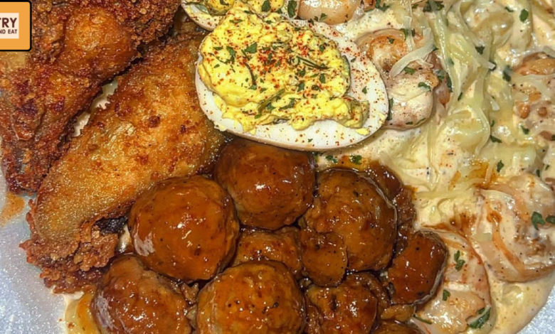 southern comfort food platter with crispy chicken creamy pasta and glazed meatballs